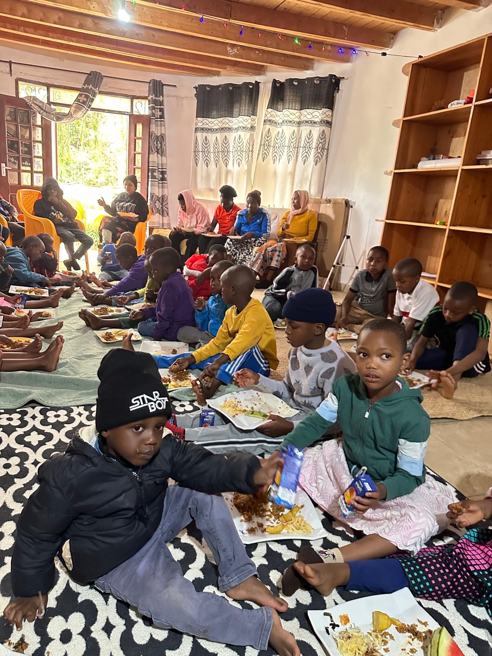 Children at an orphanage participating in a mental health and wellness session in Tanzania